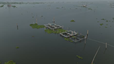 chellanam harbour is a fishing harbor in kerala, india, kerala travel and tourism background, sunrise scene of kerala backwaters with boat, tropical river view with morning sunlight through palm trees