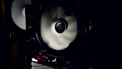 white computer fan cooling dark computer