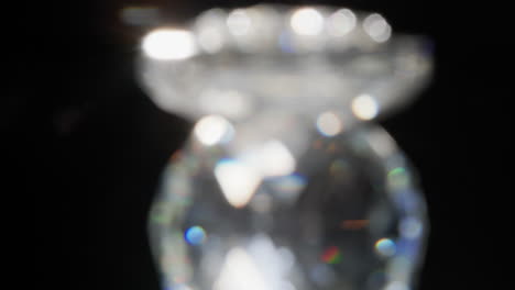 prism abstract rotating on turning table black background