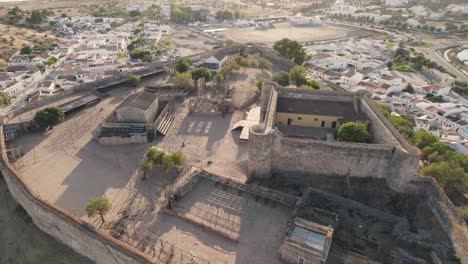 spectacular aerial shot orbiting the great moorish medieval castle, castro marim, algarve, portugal