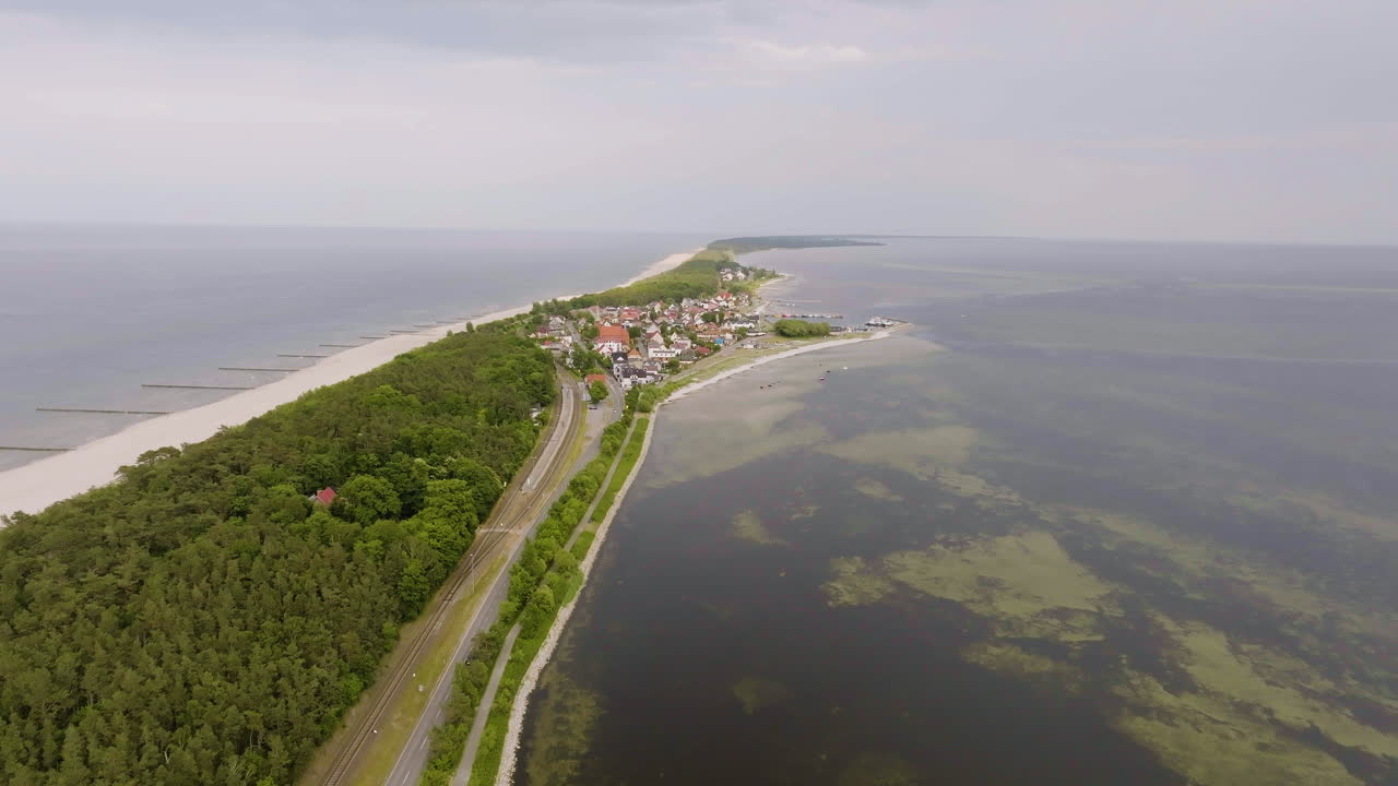 Aerial view approaching the Kuznica town, summer day in the Hel Peninsula, Poland