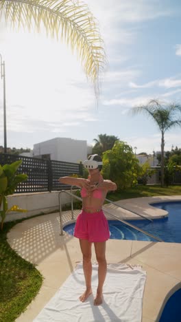 woman wearing vr headset by the pool