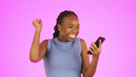 black woman, phone and dancing in celebration
