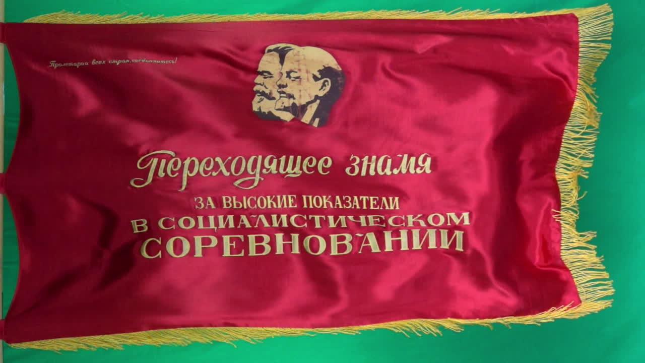 Soviet Flag Depicting Marx And Lenin Flies In Slow Motion Against A ...