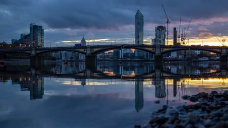 timelapse of sunset over battersea bridge chelsea harbour london