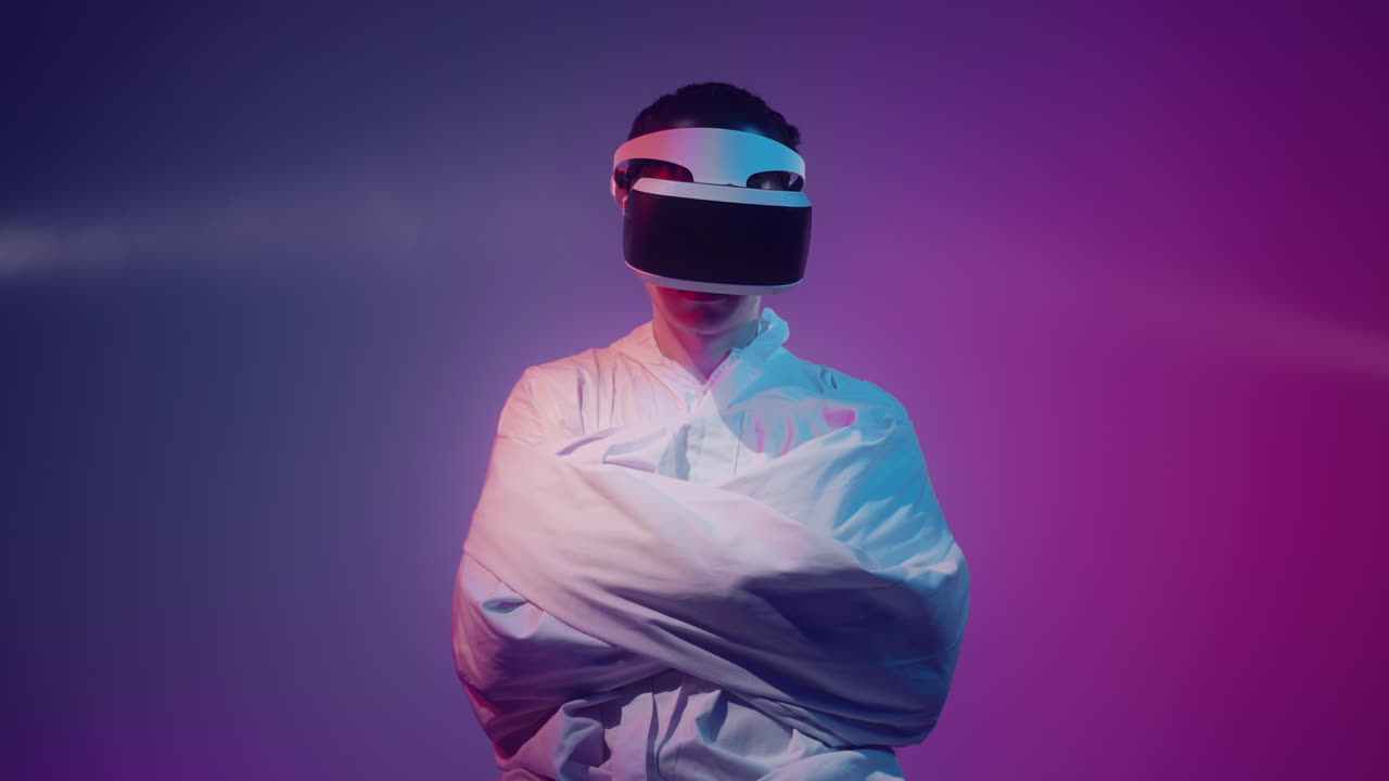Man in VR headset and straitjacket in neon lighting