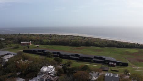 aerial rising and panning shot of battery jasper gun battery along the atlantic coast on sullivan's island, south carolina