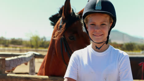 Portrait-of-girl-standing-with-arms-crossed-in-ranch-4k