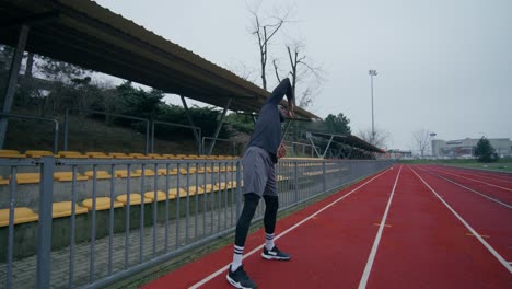 man working out at stadium