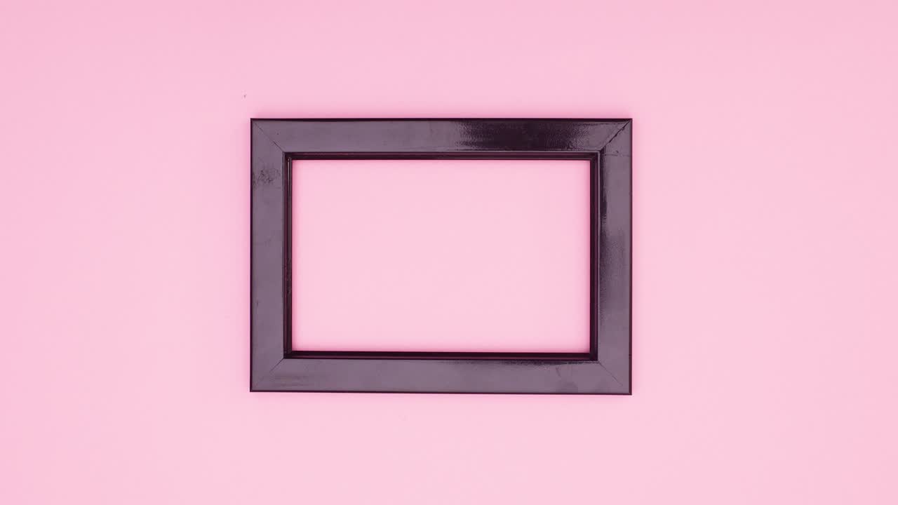 Romantic roses appear on left side of black frame for text. Stop motion