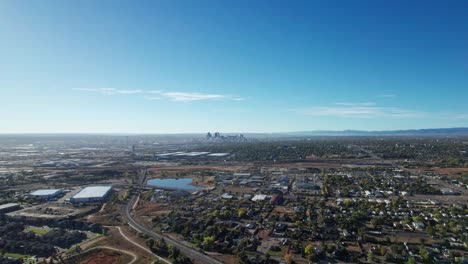 drone aerial view flying to the left of downtown denver skyline