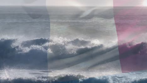 animación de la bandera de francia soplando sobre las olas en el mar