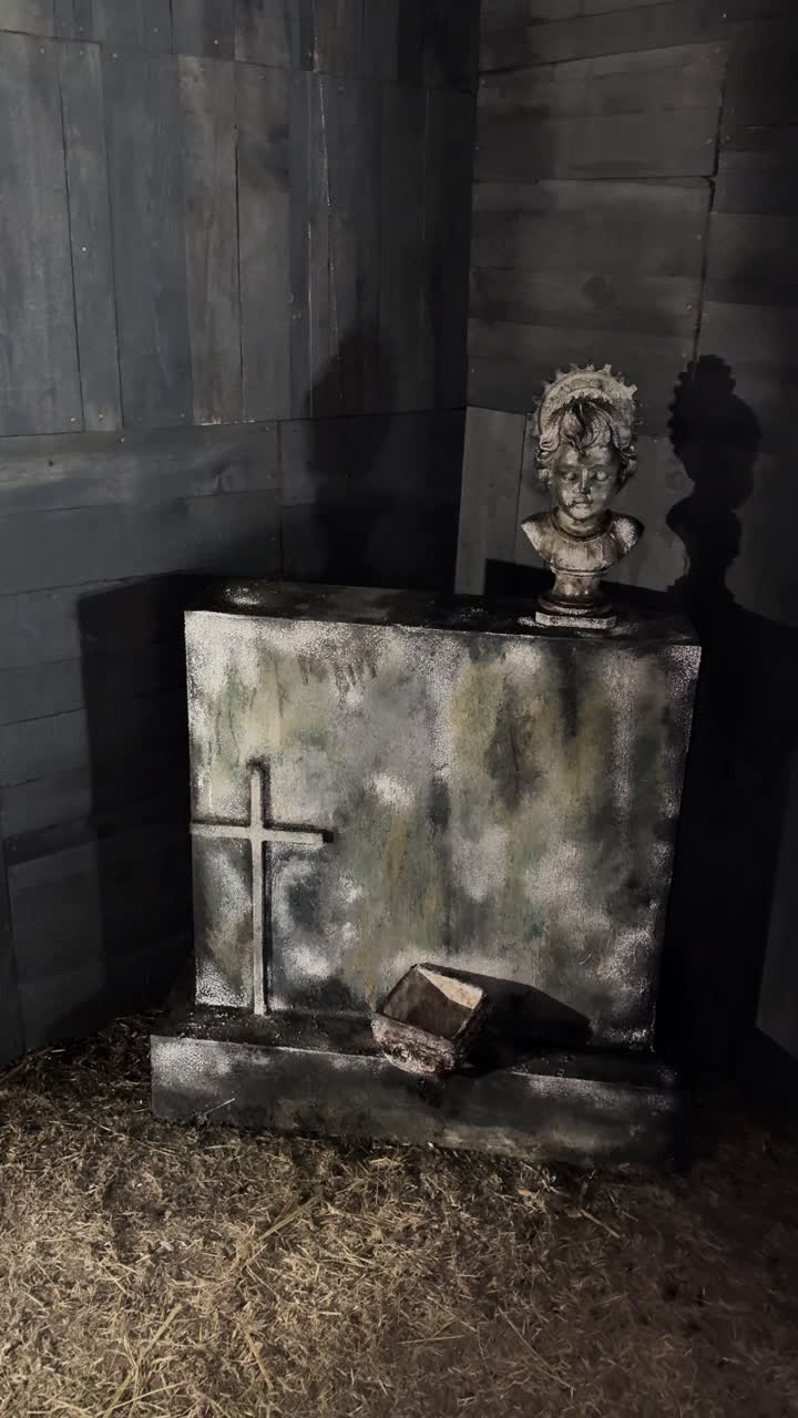 Old grave with child's bust evokes abandonment and solitude