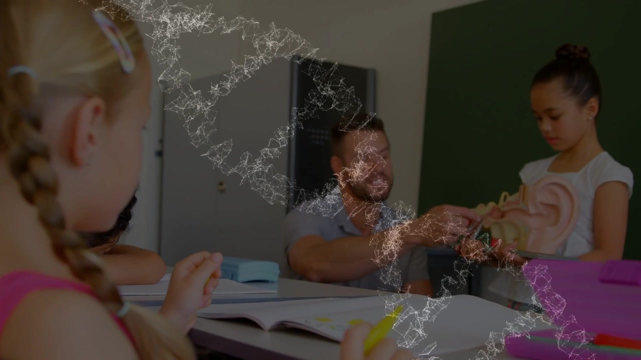 Classroom teacher passing prop to student, child holding yellow marker turning as sparkles drifting