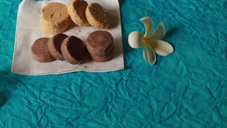 biscuits and ginger breads on a conveyor belt in a bakery