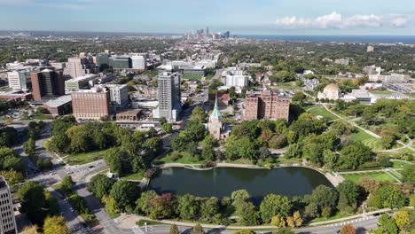 suburbs of cleveland, ohio usa, drone shot of university circle united methodist church and wade lagoon