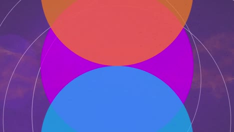 Animation-of-blue,-pink-and-yellow-circles-moving-over-violet-background