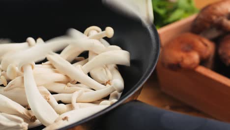 white mushrooms in a pan