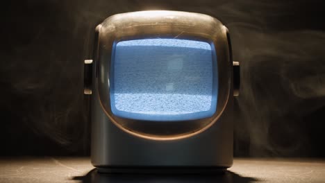 retro tv, vintage television in a nostalgic setup, a retro tv displays grain on screen, scary halloween night device good for chroma key and green screen. high quality 4k footage