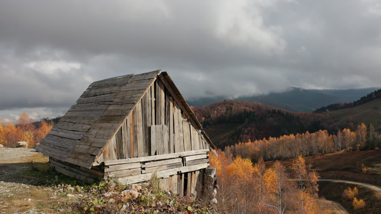 Rustic Wooden Hut In The Mountains Near The Amfiteatrul Transilvania Complex In Transylvania, Romania. Static Shot