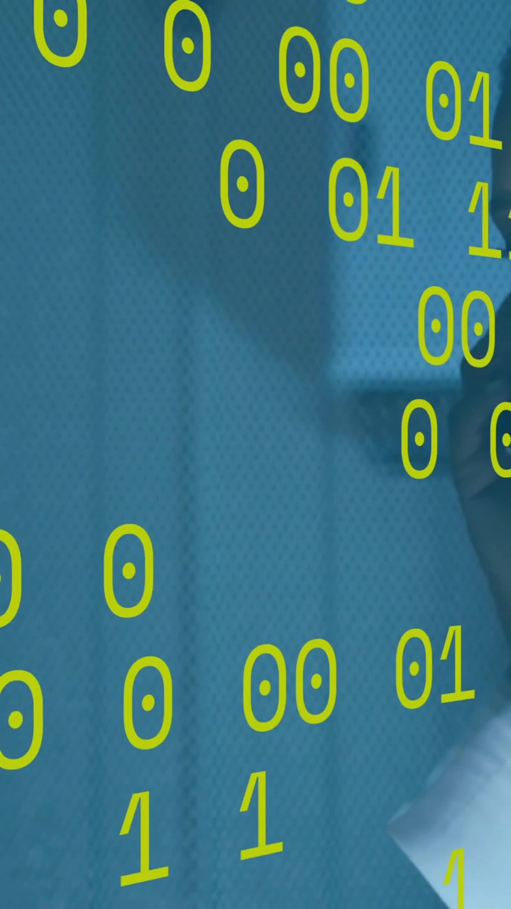 Lavorando con cavi del computer, persona circondata da animazione di codice binario in una scuola