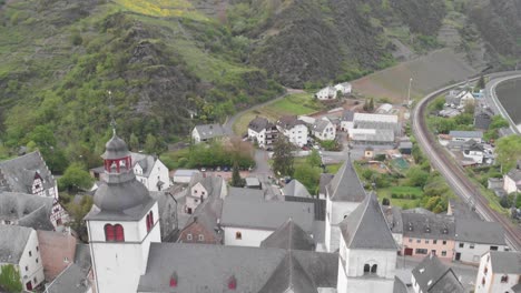 Drone-view-of-the-ancient-St-Castor-church-in-Treis-Karden,-Germany