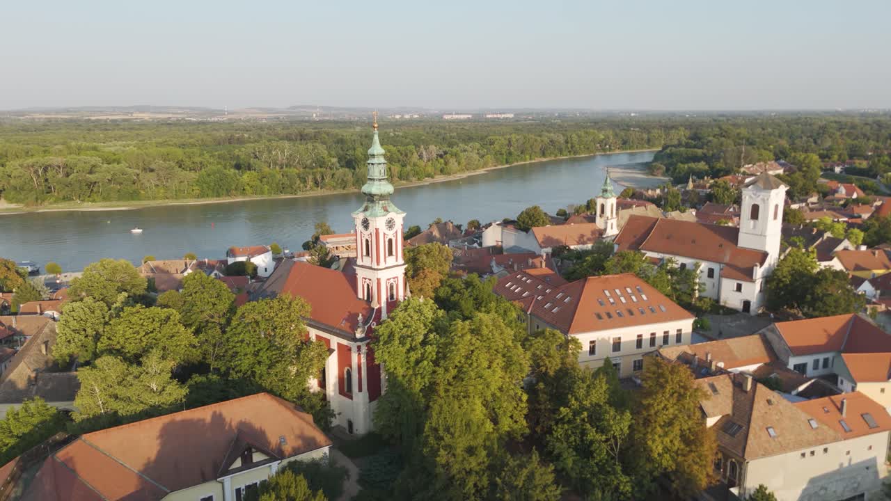 Szentendre’s cityscape with the Danube River in the distance, highlighting its picturesque rooftops and historic charm