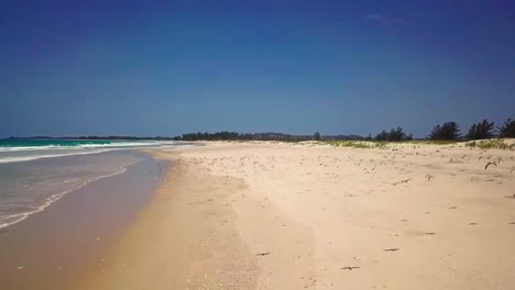 Aerial-fly-beach-sand-sky-birds