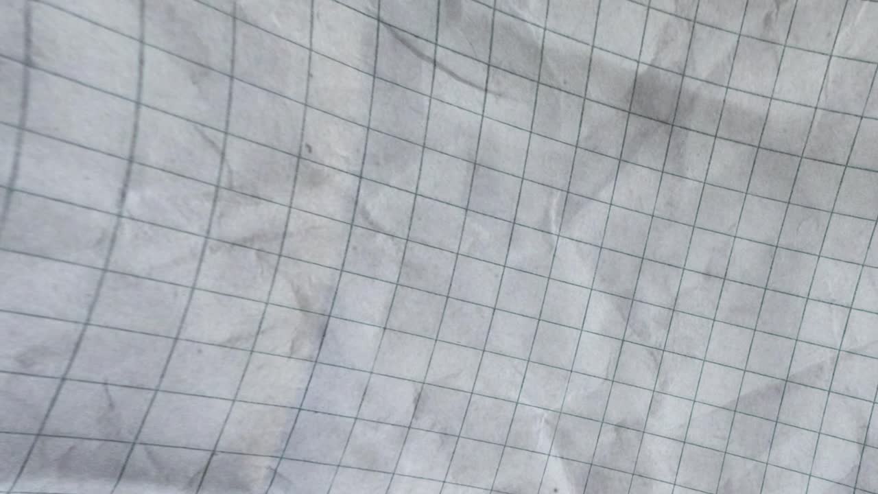 Moving Abstract Background of Crumpled Grid Paper Texture