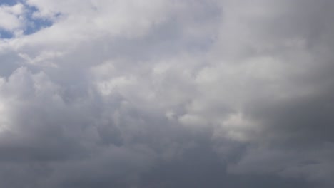 running clouds, time lapse covers the earth with thick rain clouds, close-up of rain clouds