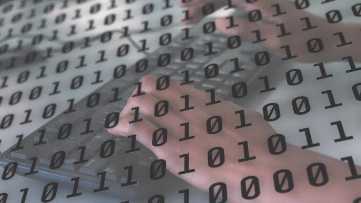 Binary coding data processing against person using laptop in background