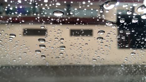 close-up of wet windshield during rainy season