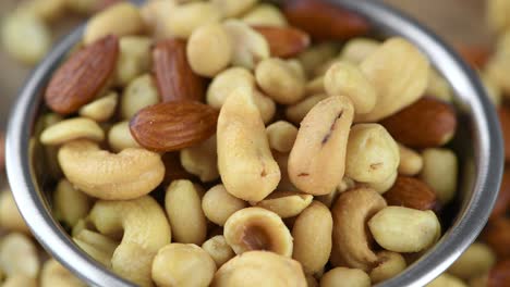 freshly roasted nuts on a rotating plate (seamless loopable)