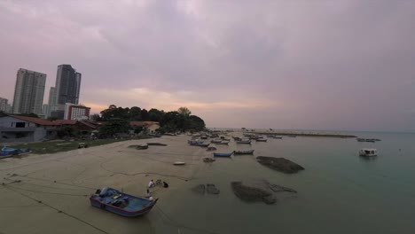 boat-along-the-seaside,-beach