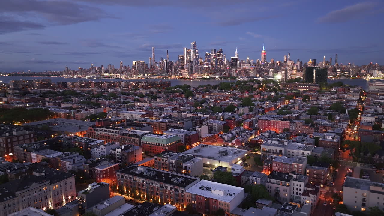 Aerial view of Hoboken at night. Shot with Midtown Manhattan in the background.