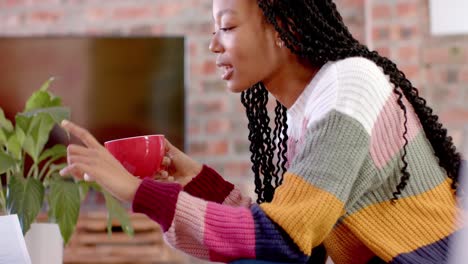 montage of african american casual businesswoman working in office, slow motion