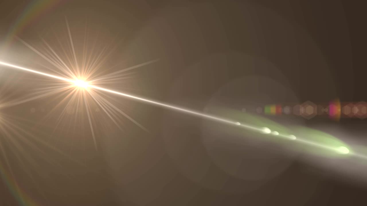 검은 배경에 대한 빛의 반점과 렌즈 플레어