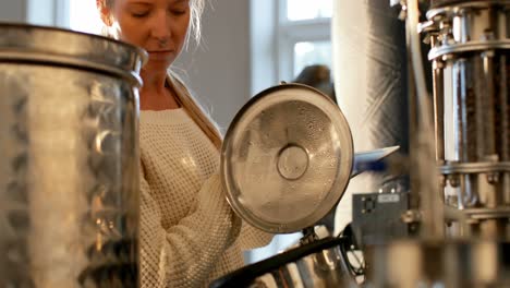 female worker using digital tablet in distillery factory 4k