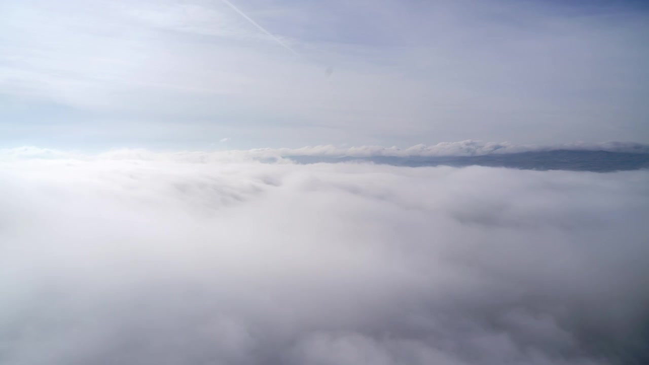 Aerial View of Thick Clouds Covering the Landscape