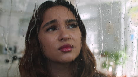 woman looking through the window