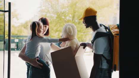 family receiving delivery