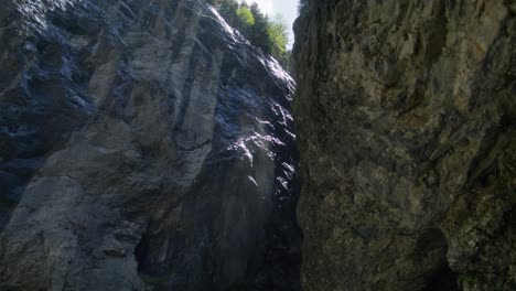 misty water in cave opening | grindelwald switzerland cave in glacier canyon, europe, 4k