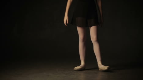 beautiful little girl ballerina dancing in ballet studio