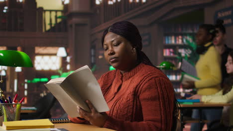 woman reading in a library