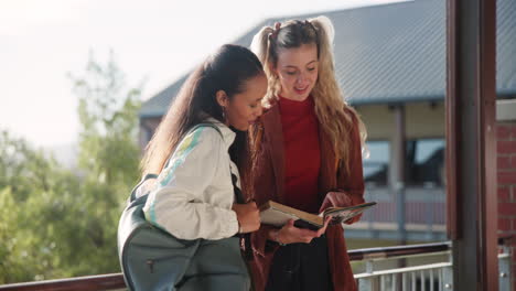teenage students reading together at school