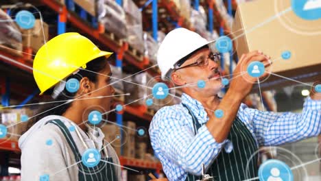 Animation-of-network-of-connections-over-man-and-woman-working-in-warehouse