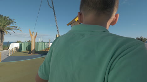 Boy-taking-cable-ride-at-the-playground