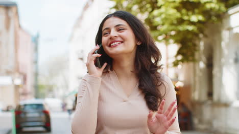 Happy-surprised-woman-involved-in-pleasant-conversation-phone-call-good-news-enjoying-talking-gossip