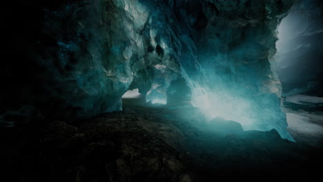 blue ice cave covered with snow and flooded with light