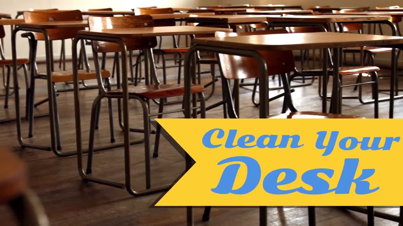 Animation of clean your desk text over empty classroom
